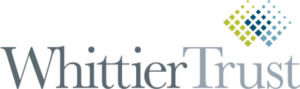 A colored vertical logo of Whittier Trust.
