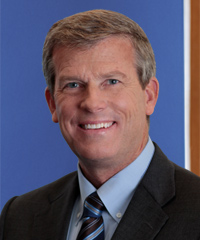 A professional headshot of David Dahl.