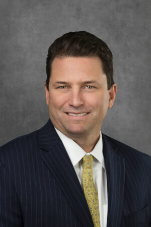 A professional headshot of Robert Levy.